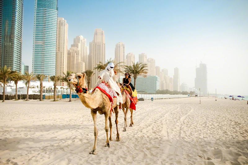 CJ Miles Riding a Camel in Dubai