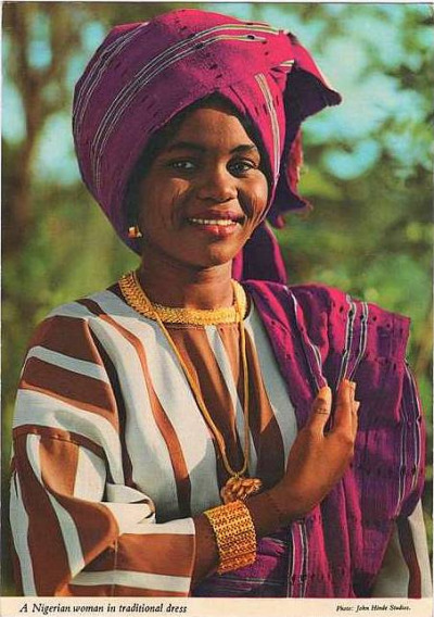 A Nigerian woman in Traditional dress. Photo by John Hinde