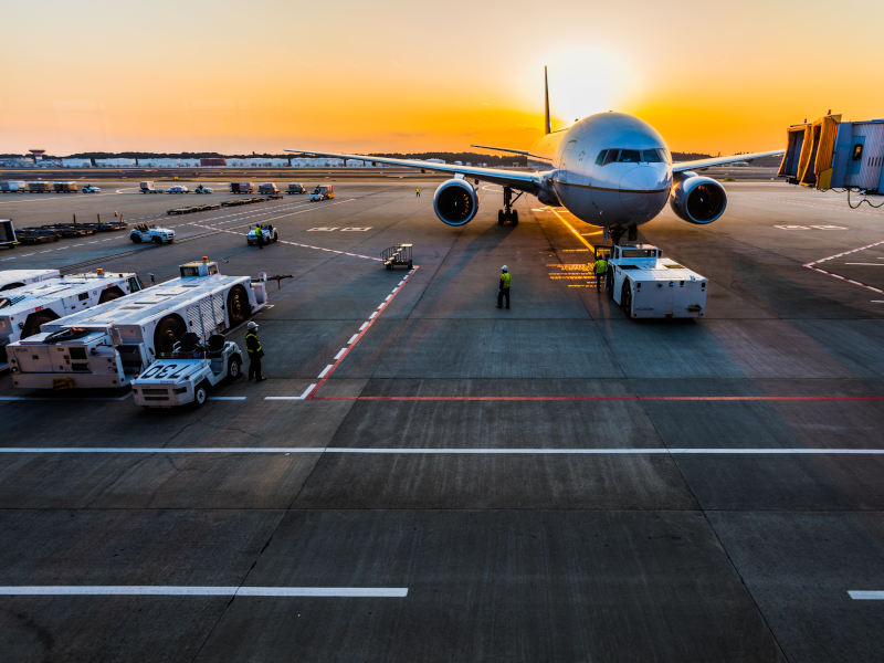 plane preparing for take off sunset flight delays
