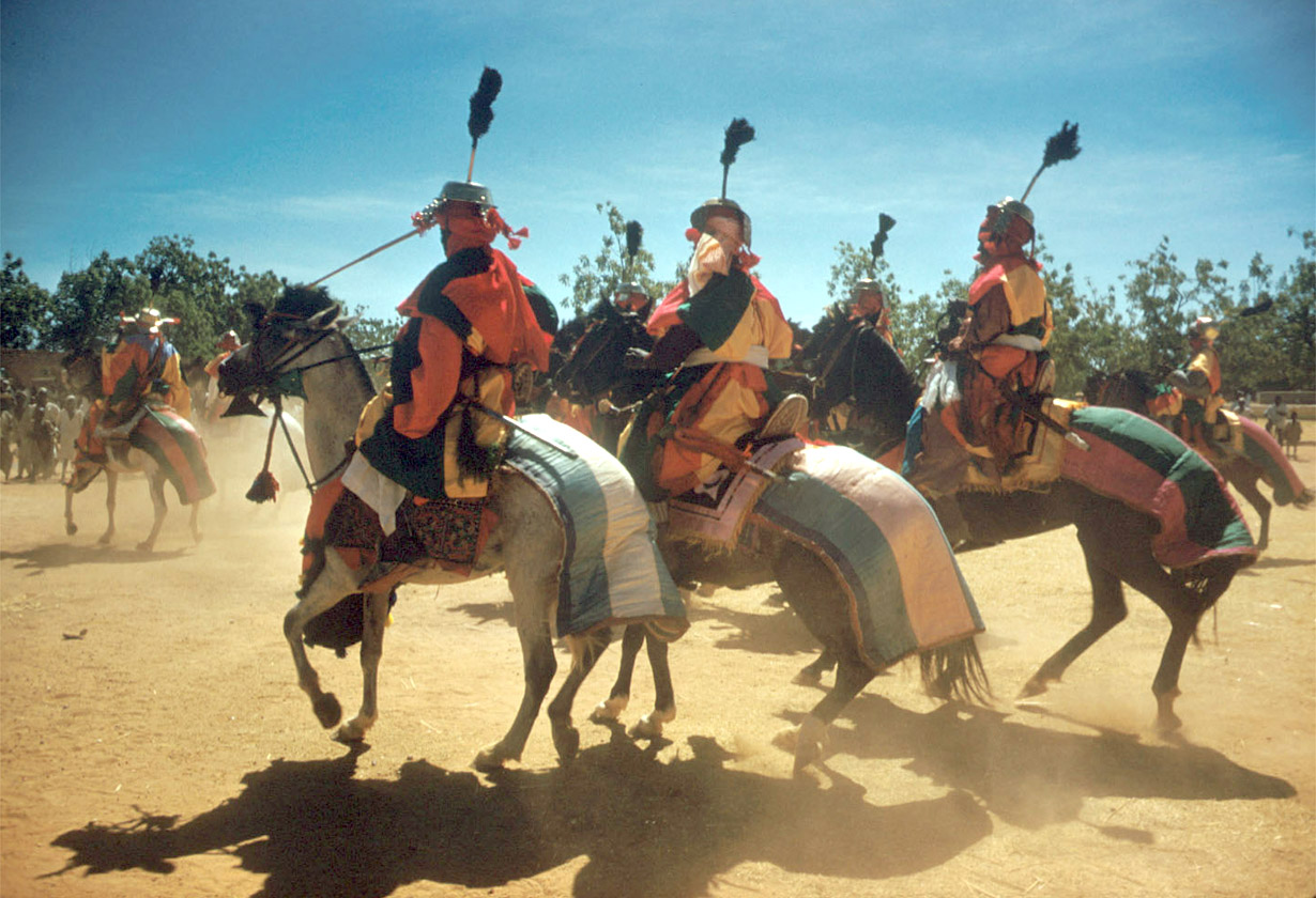 Regiment of mounted armed guards in a procession during festival of Sallah, Katsina, Nigeria